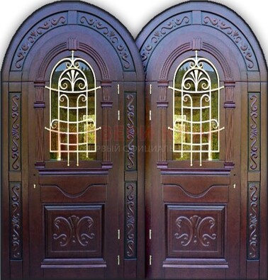 Индивидуальная арочная дверь со стеклом и ковкой ДА-19 в Брянске