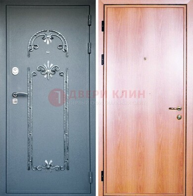 Железная дверь с ковкой ламинат внутри ДК-11 в квартиру в Брянске
