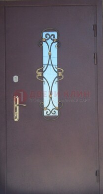 Металлическая дверь со стеклом и ковкой ДСК-77 в Брянске